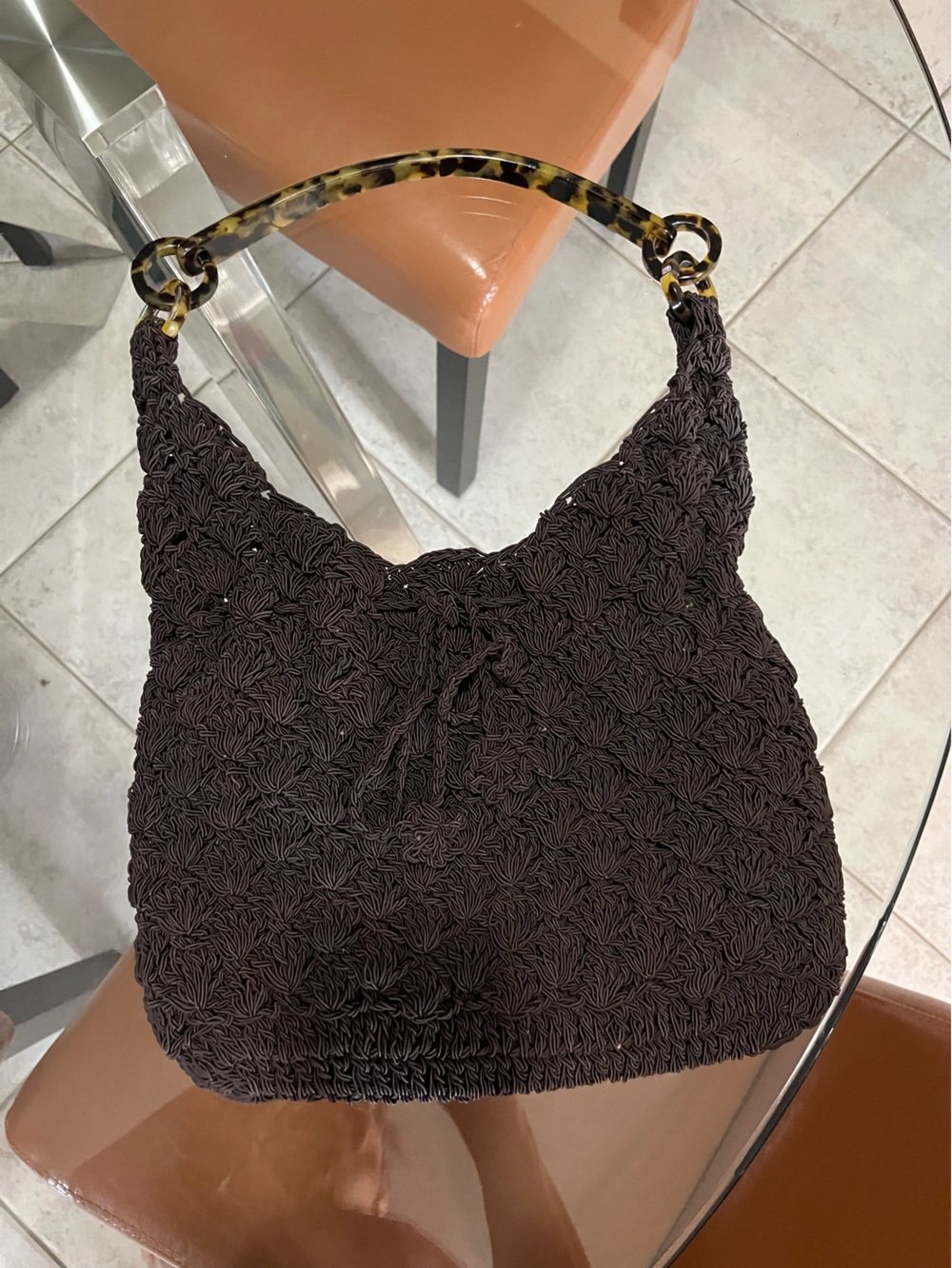Woven hobo bag with super cool shoulder strap.